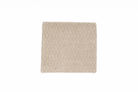 Handwoven beige hemp pillowcase with modern herringbone pattern, eco-friendly.