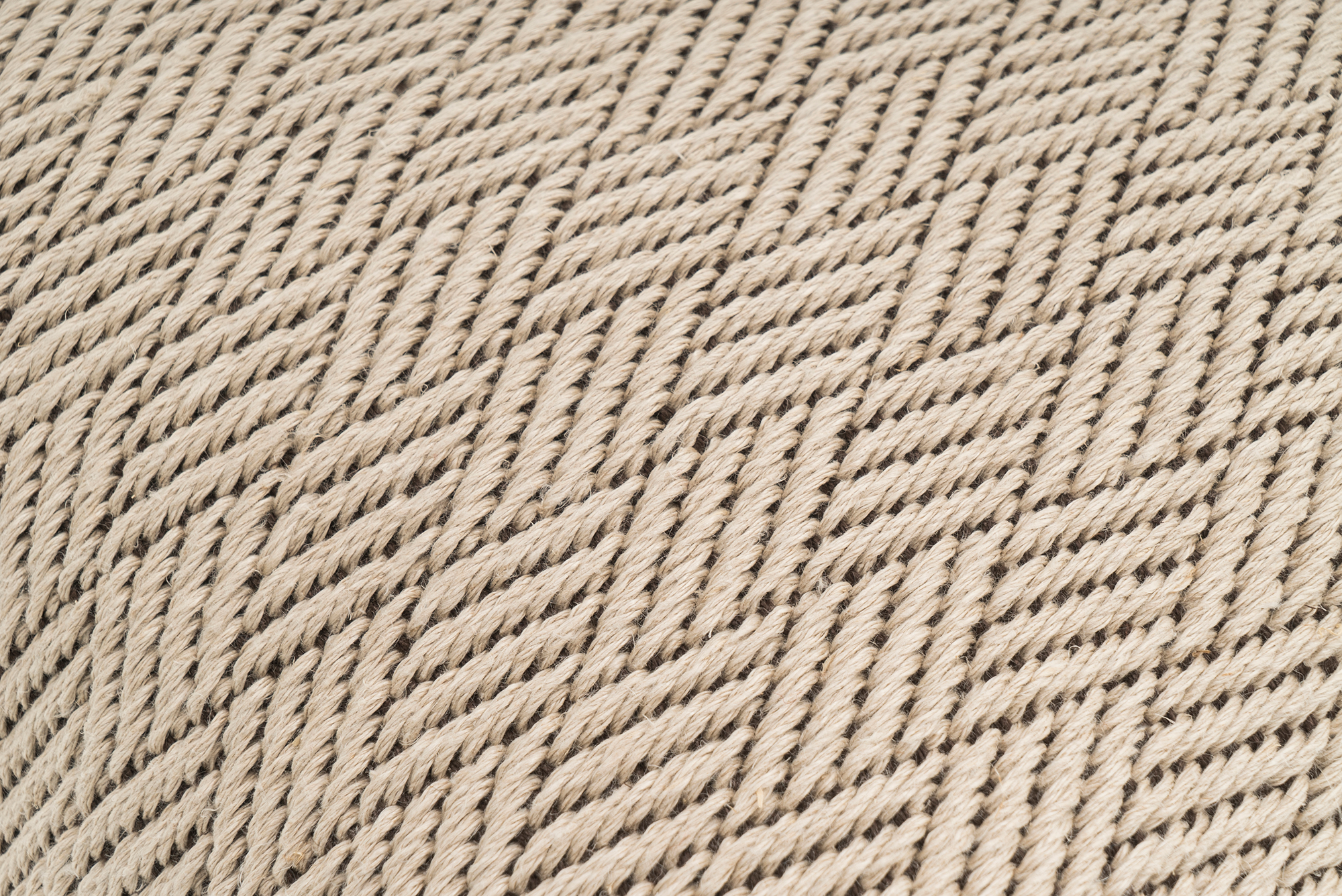 Eco-conscious handwoven hemp pillowcase, beige with textured herringbone.