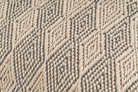 Artisan-crafted hemp pillow cover, beige diamond weave, supports vocational school.