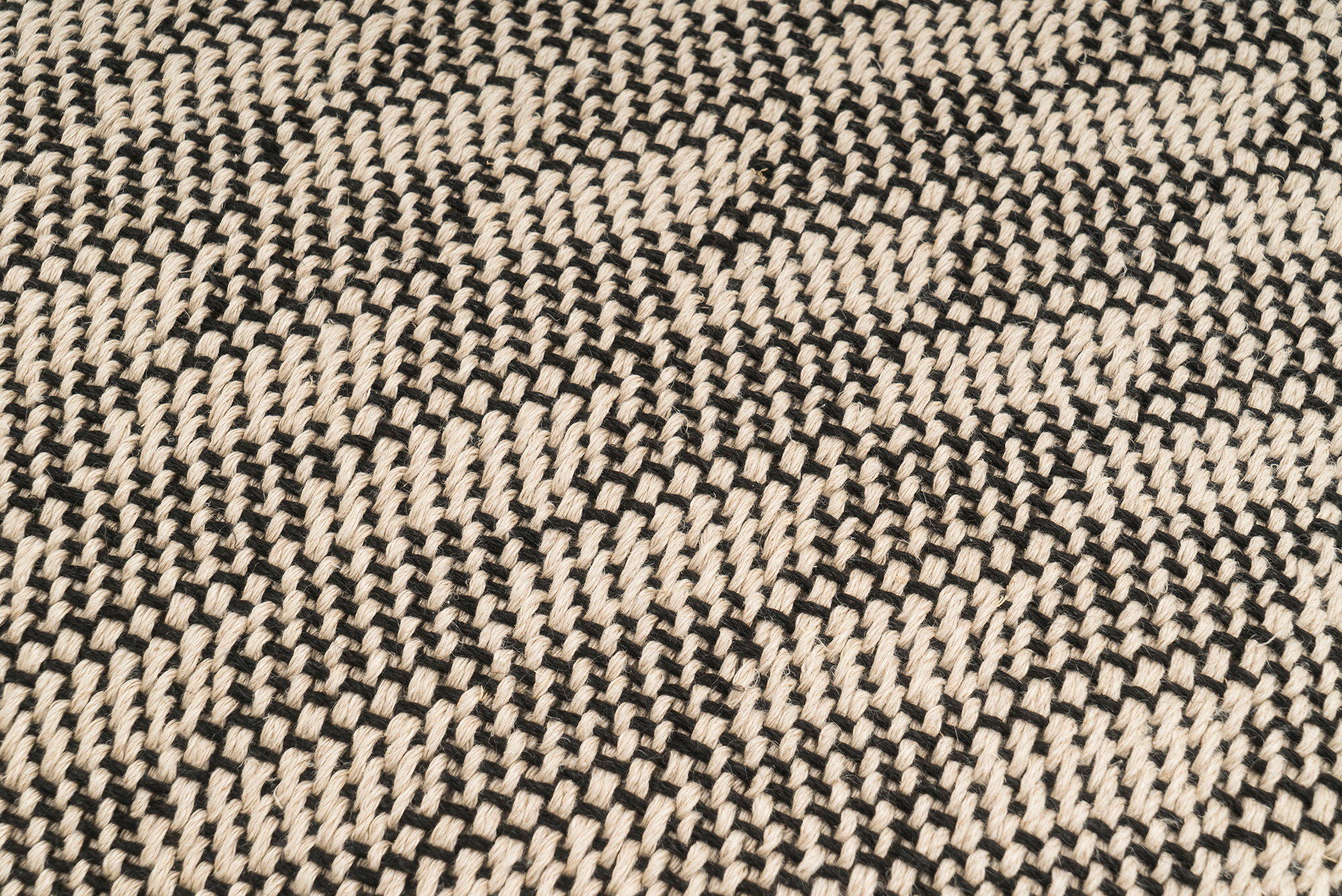 Handcrafted hemp pillow cover, featuring chevron and zigzag design, sustainable materials.