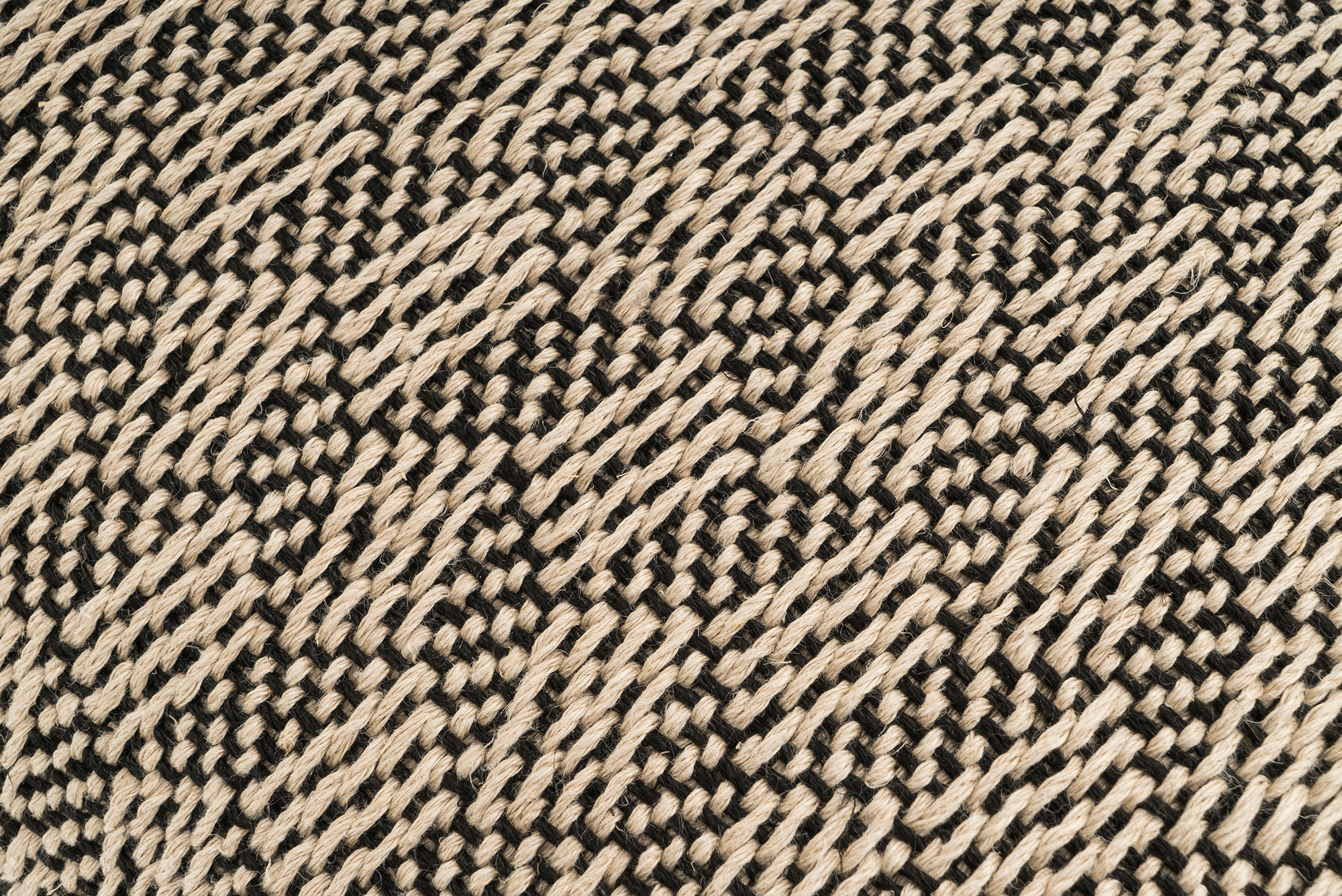 Eco-conscious hemp pillowcase, handwoven with modern herringbone pattern.