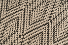 Eco-conscious hemp pillowcase, handwoven with black and beige chevron pattern.