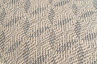 Sustainable hemp pillow cover, handwoven with unique chevron pattern, beige and gray.