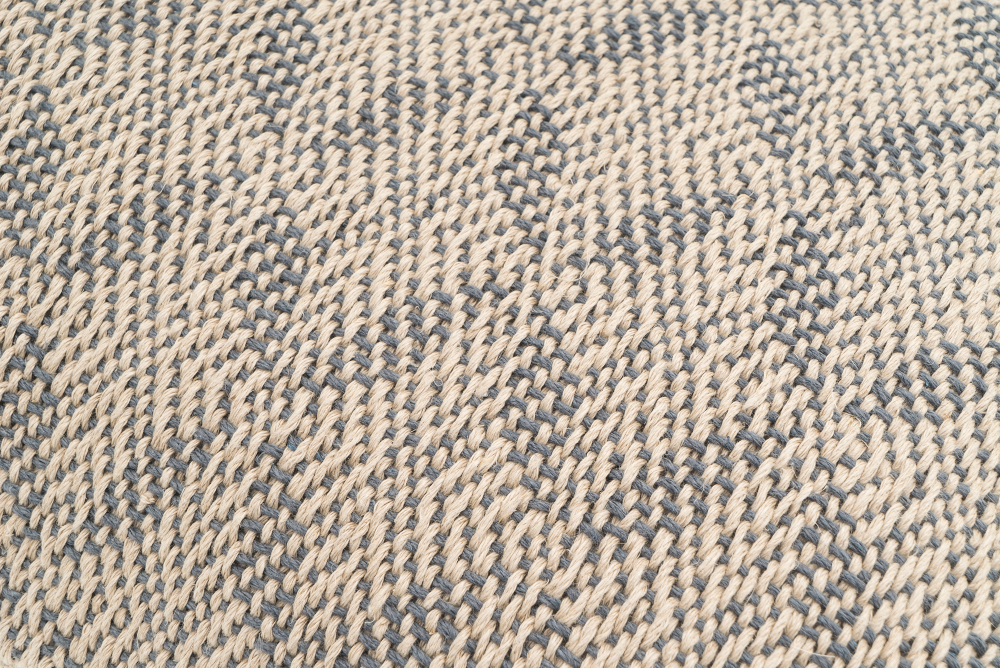 Sustainable hemp pillow cover, handwoven with unique chevron pattern, beige and gray.