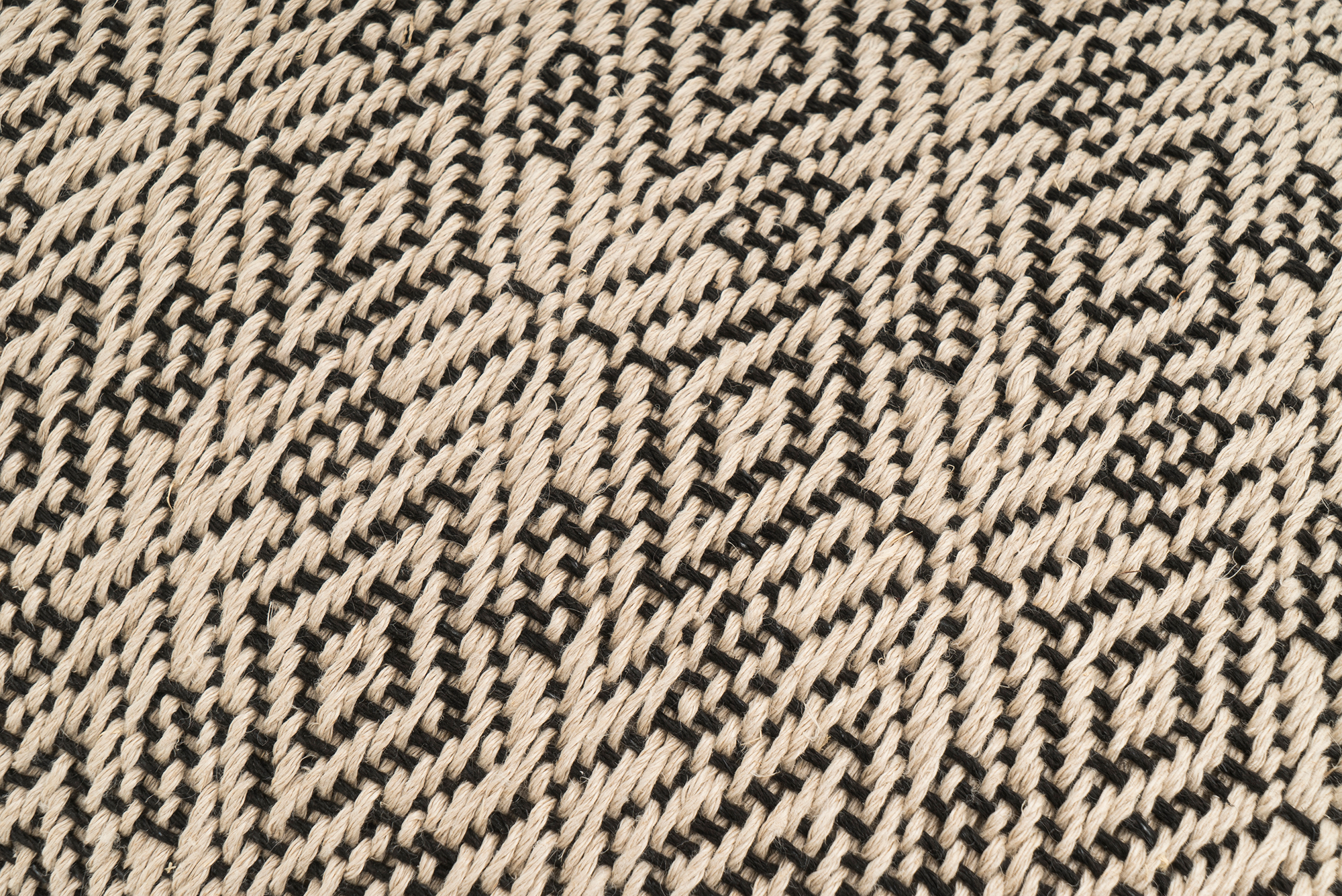Artisan-crafted hemp pillowcase, diamond-weave pattern, sustainable and elegant.