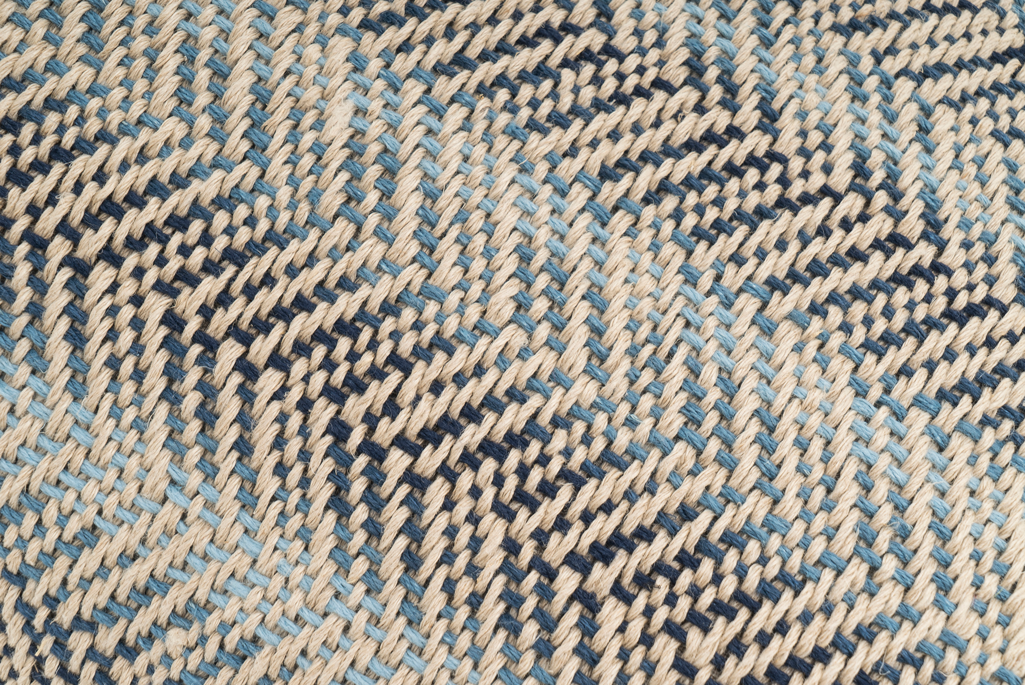 Eco-conscious hemp pillowcase, handwoven, beige, geometric pattern.