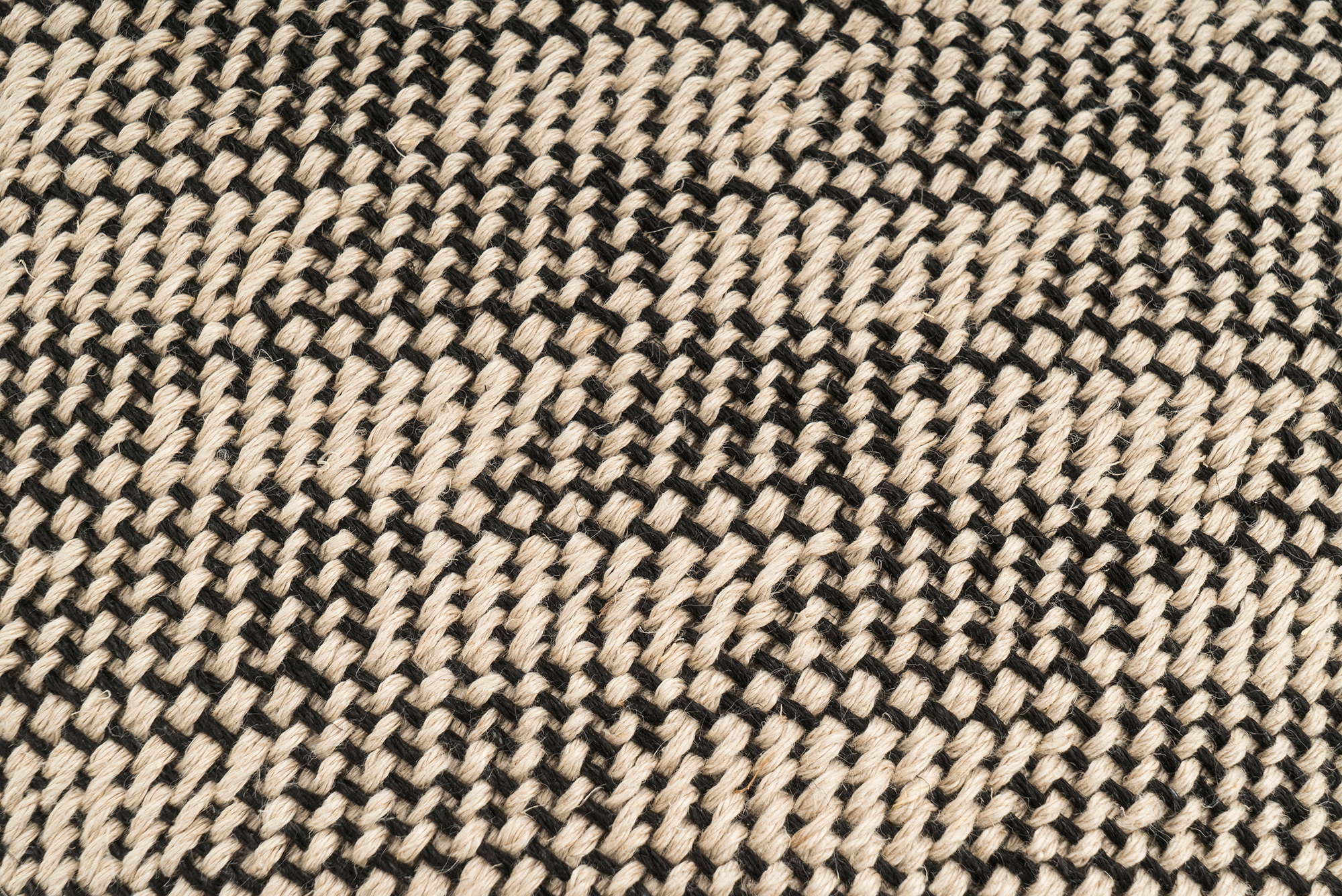 Artisan-crafted Solstice hemp pillow case, sustainable, beige and black herringbone.