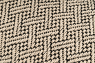 Artisan-crafted hemp pillow case, modern chevron pattern, sustainable material.