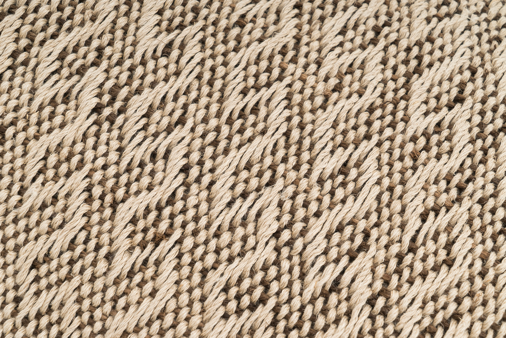 Sustainable hemp pillowcase, handwoven with chevron pattern, natural beige color.
