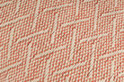 Eco-conscious hemp pillowcase, handwoven with modern peach herringbone pattern.