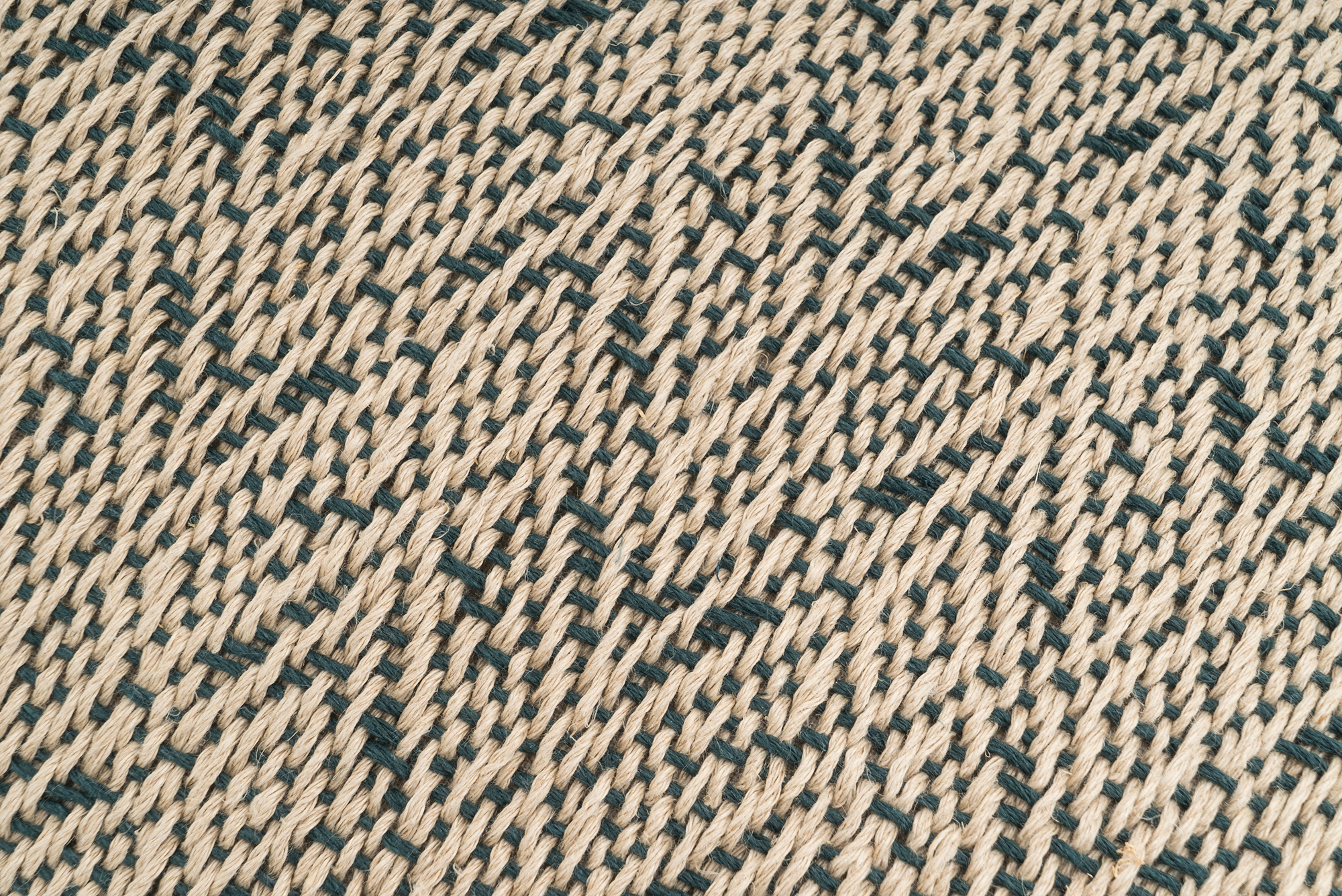 Sustainable hemp pillowcase, handwoven with rustic geometric motifs, beige and black.