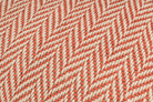 Artisan hemp pillowcase, featuring modern orange and white chevron design.