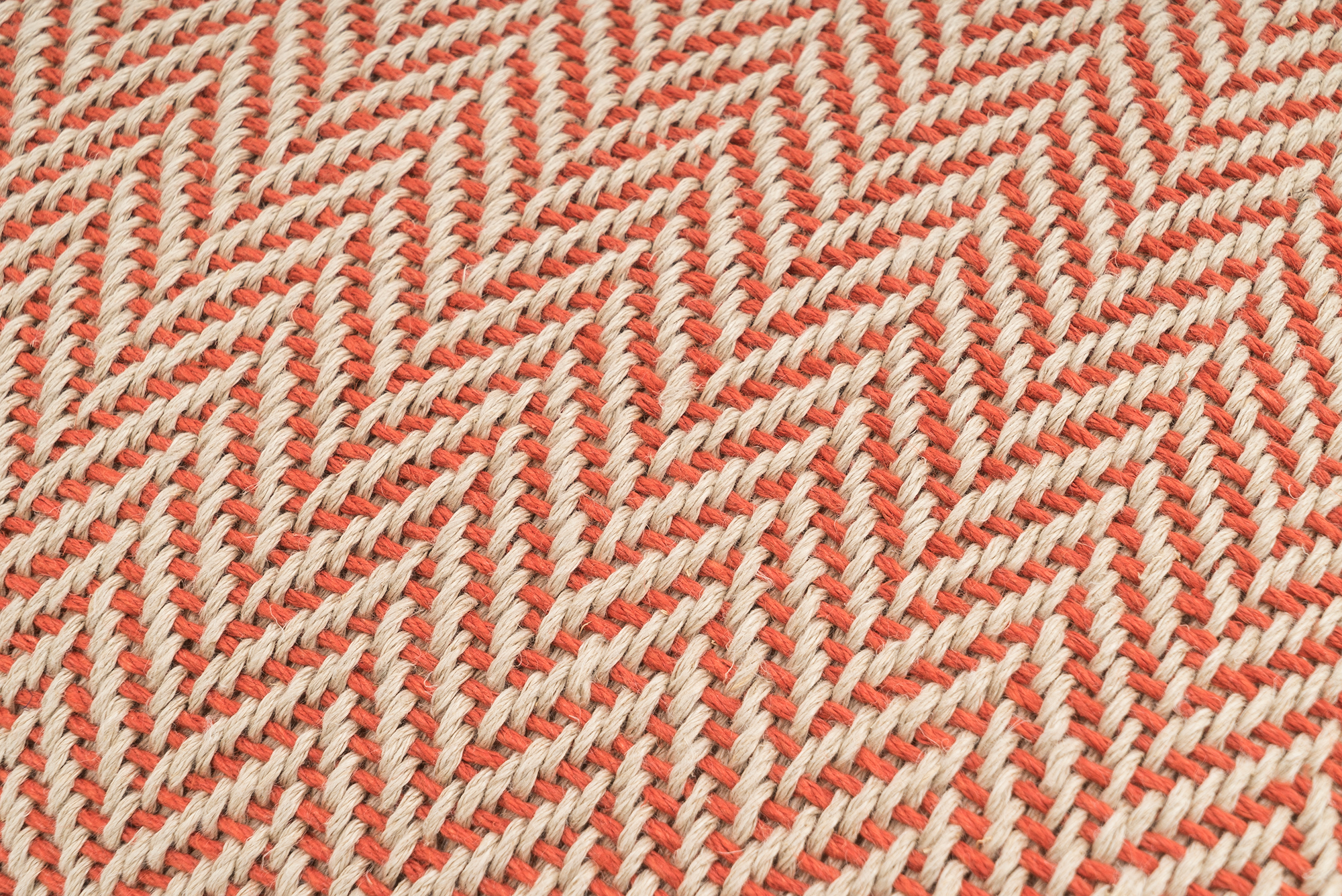 Artisan hemp pillowcase, featuring modern orange and white chevron design.