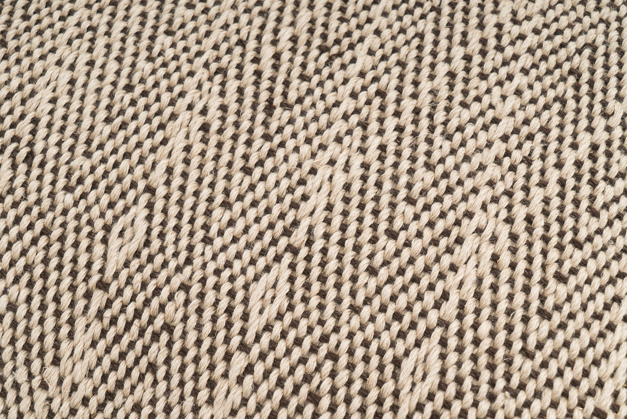 Eco-conscious beige hemp pillowcase, handwoven with geometric chevron design.
