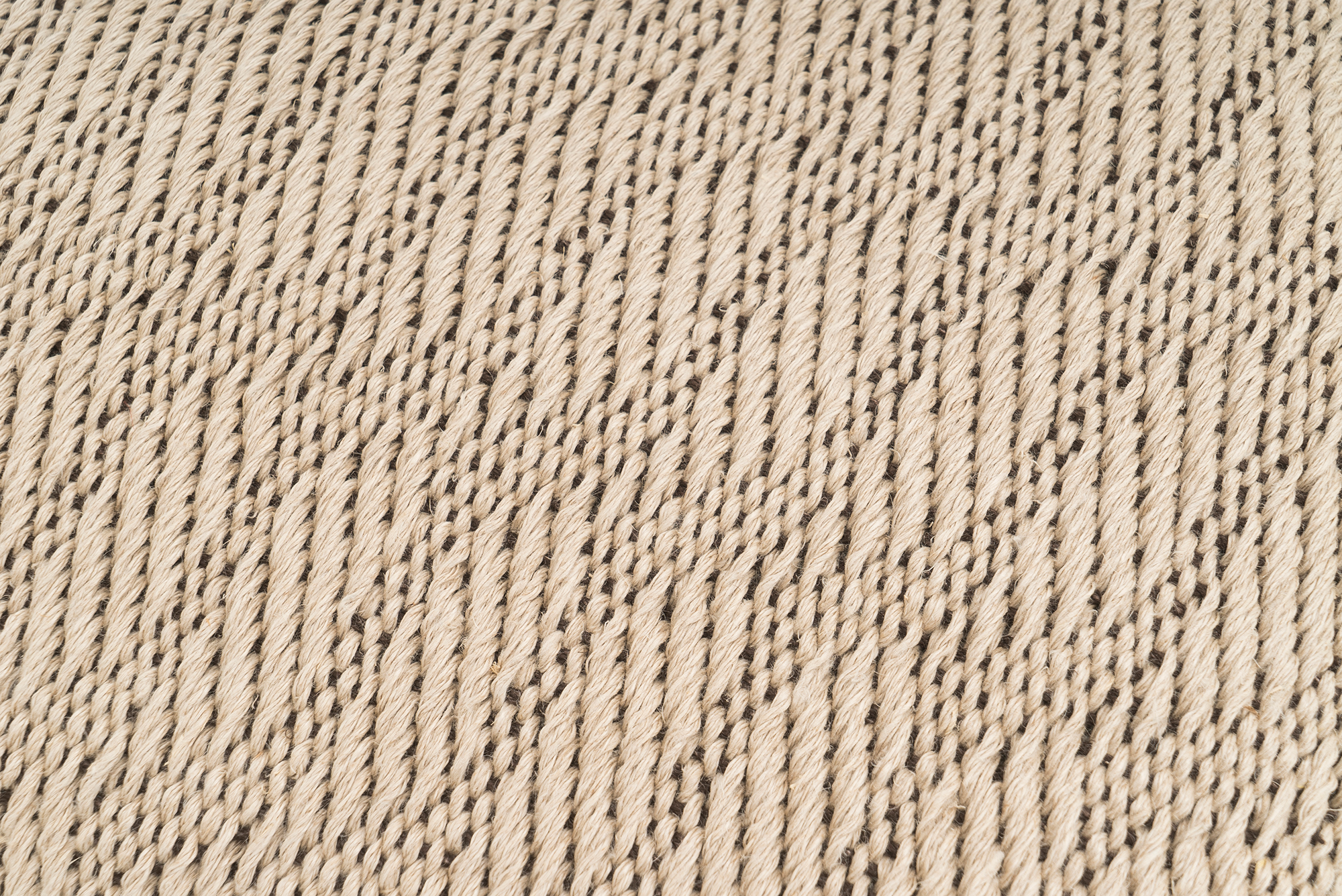 Artisan-crafted hemp pillow case, rustic chevron pattern, sustainable material.