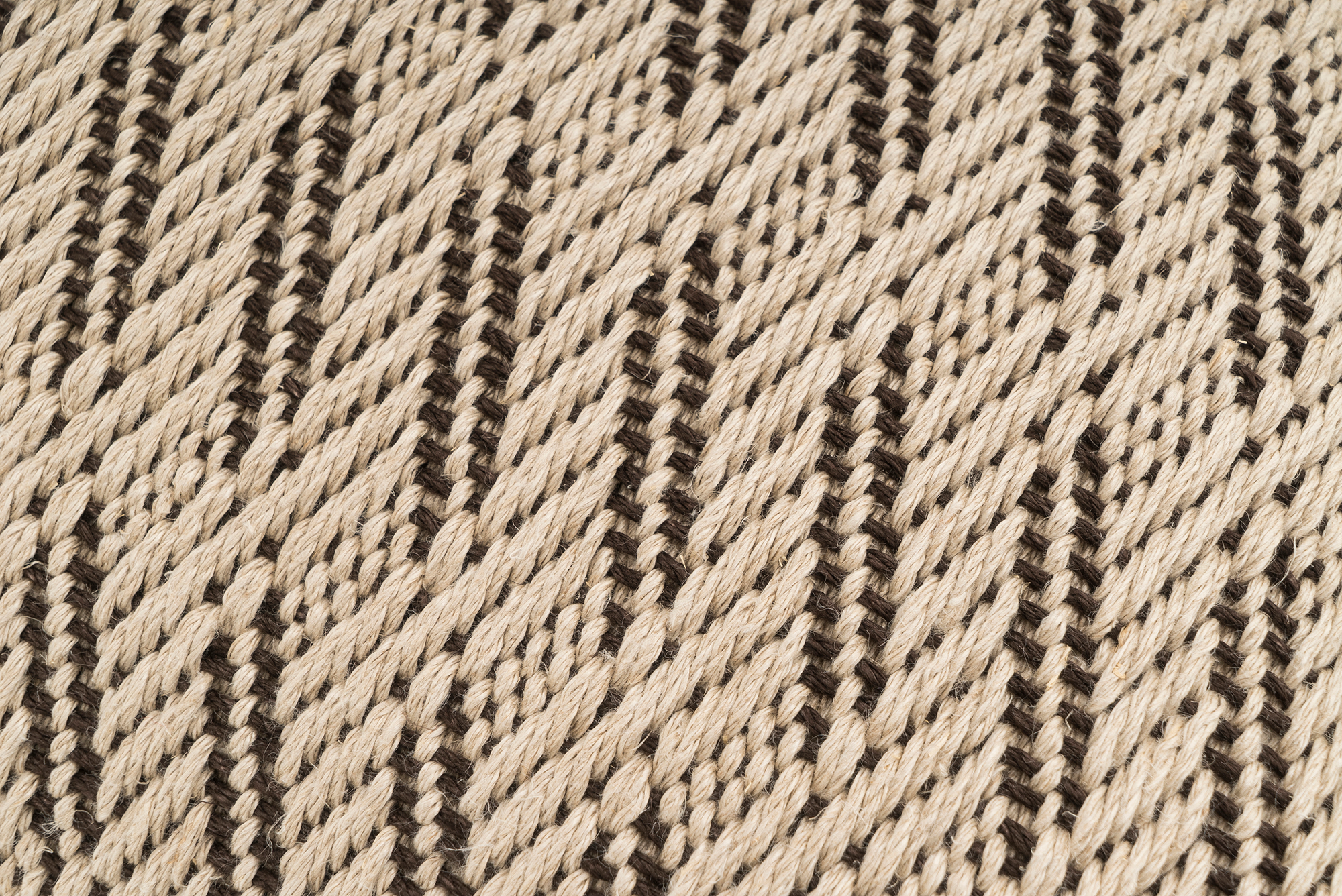 Sustainable Romanian hemp pillowcase, handwoven with unique zigzag design, beige and black.
