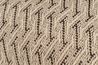 Sustainable hemp pillowcase, handwoven with zigzag design, beige and black tones.
