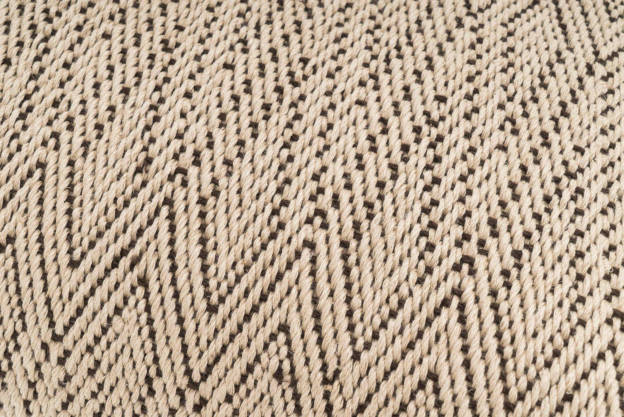 Artisan-crafted hemp pillowcase, featuring a rustic chevron pattern, beige, eco-friendly.